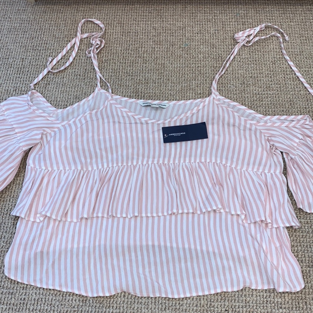 Pink and white striped blouse